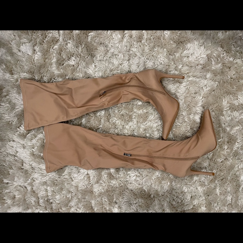Ego Nude Thigh high heeled boots.